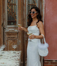 Load image into Gallery viewer, bride wearing hive feather trim bridal handbag in white