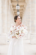 Load image into Gallery viewer, bride wearing Amarnam dacope silk flower bridal earrings