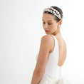 Load image into Gallery viewer, Woman wearing a white dress and floral headband on a white background