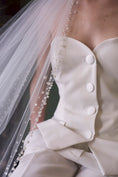 Load image into Gallery viewer, woman wearing hayze bridal pearl edge veil