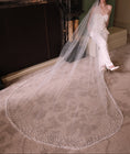 Load image into Gallery viewer, woman wearing hayze bridal pearl edge veil