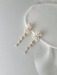 Load image into Gallery viewer, Pearl hairpins on a white surface