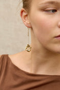 Load image into Gallery viewer, woman wearing gold and silver earrings