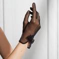 Load image into Gallery viewer, Cornelia James black bridal gloves with bow detail worn with white background