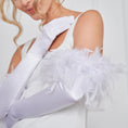 Load image into Gallery viewer, White gloves with feather detailing worn by a person on a plain background