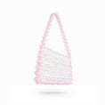 Load image into Gallery viewer, White bridal bag with pink beaded handle on a white background