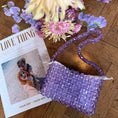 Load image into Gallery viewer, Purple beaded bridal bag with flowers and a photo on a wooden surface