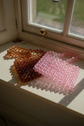 Load image into Gallery viewer, beaded bridal bags on a windowsill
