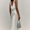 Load image into Gallery viewer, bride wearing hive metallic bridal handbag in silver
