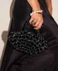Load image into Gallery viewer, woman holding nest bridal handbag in black