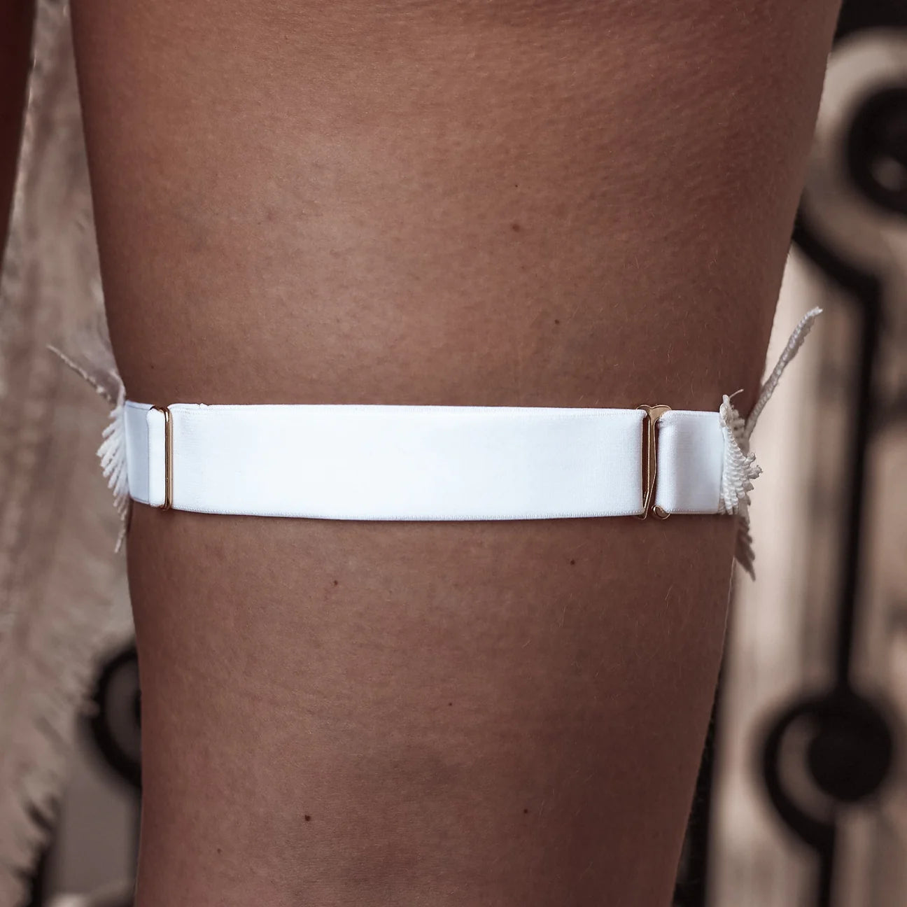woman wearing hayze bridal garter
