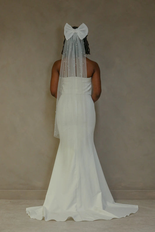 woman wearing hayze bridal hair bow