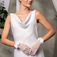 Load image into Gallery viewer, Woman wearing a white dress with gloves against a neutral background
