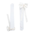 Load image into Gallery viewer, Pair of white gloves with bow details on a white background
