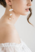 Load image into Gallery viewer, bride wearing Amarnam silk flower bridal earrings
