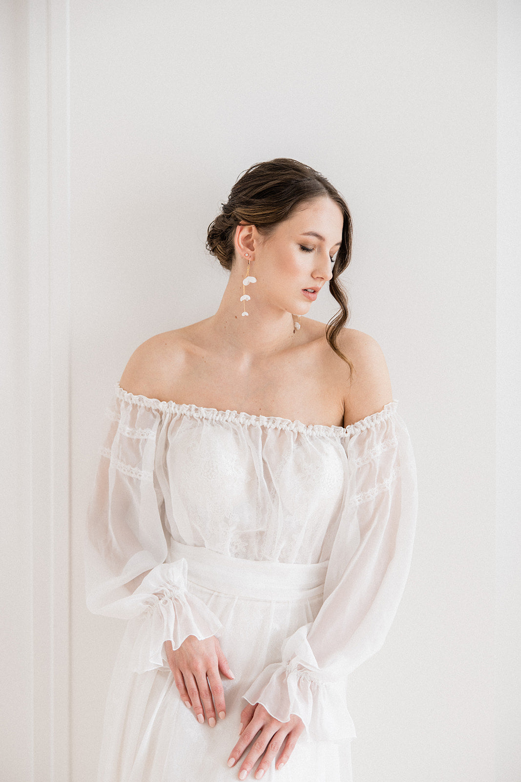 bride wearing Amarnam dacope silk flower bridal earrings
