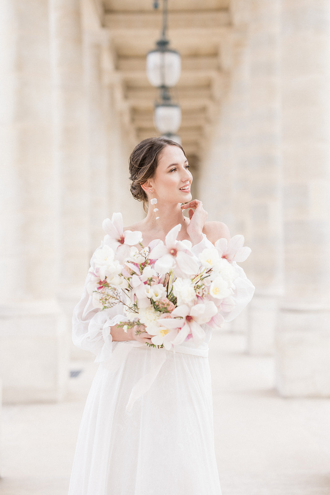 bride wearing Amarnam dacope silk flower bridal earrings
