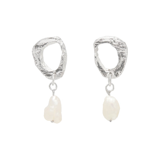 Pair of silver earrings with pearls on a white background