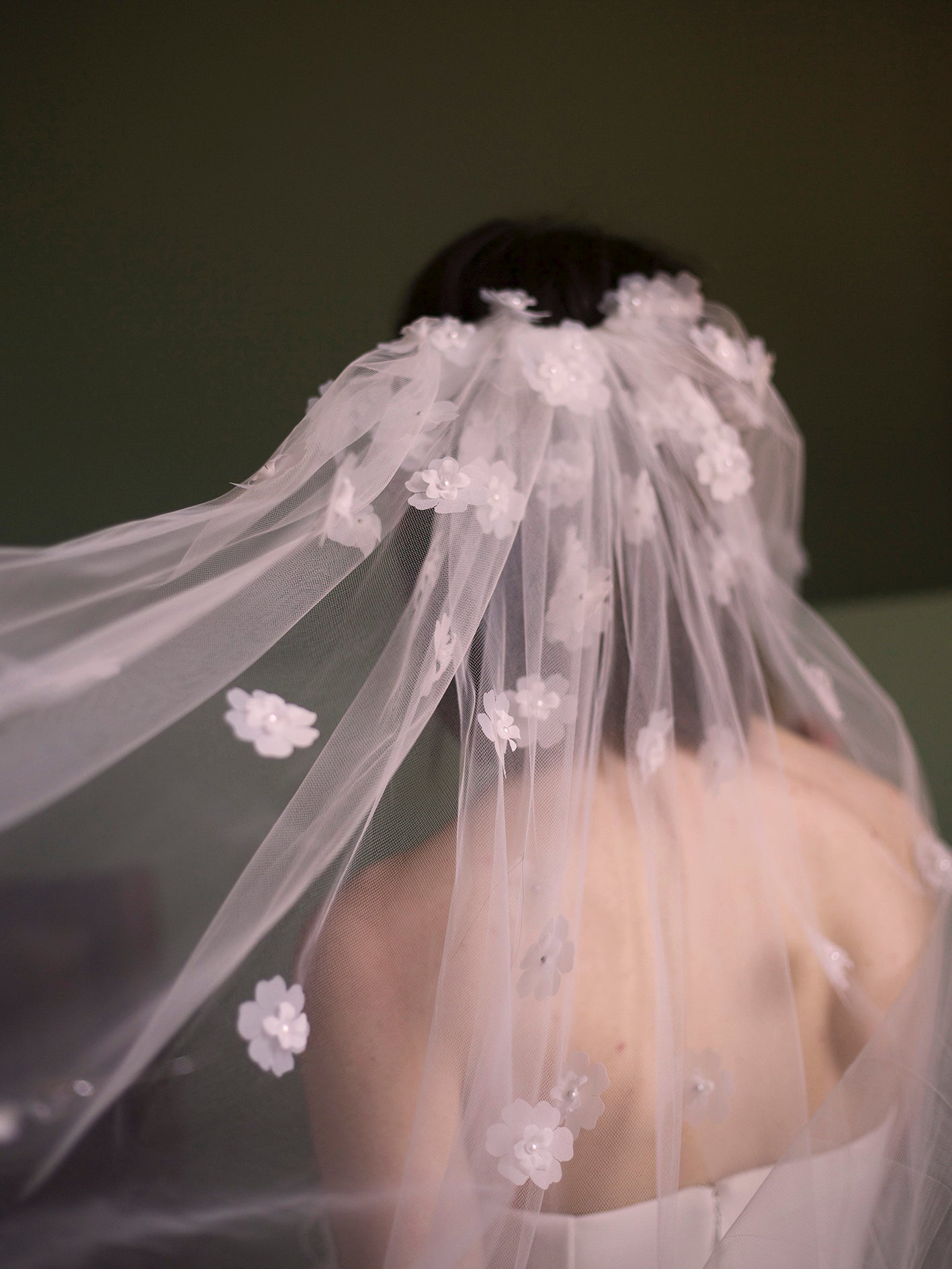 woman wearing hayze bridal veil