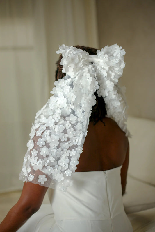 woman wearing hayze bridal hair bow