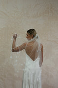 Load image into Gallery viewer, woman wearing hayze bridal petal veil
