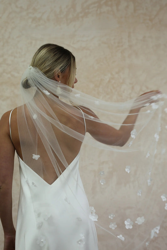 woman wearing hayze bridal petal veil