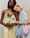 Load image into Gallery viewer, ladies wearing hive handbag in bluebell
