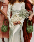 Load image into Gallery viewer, bride with bridesmaids wearing nest handbag in white
