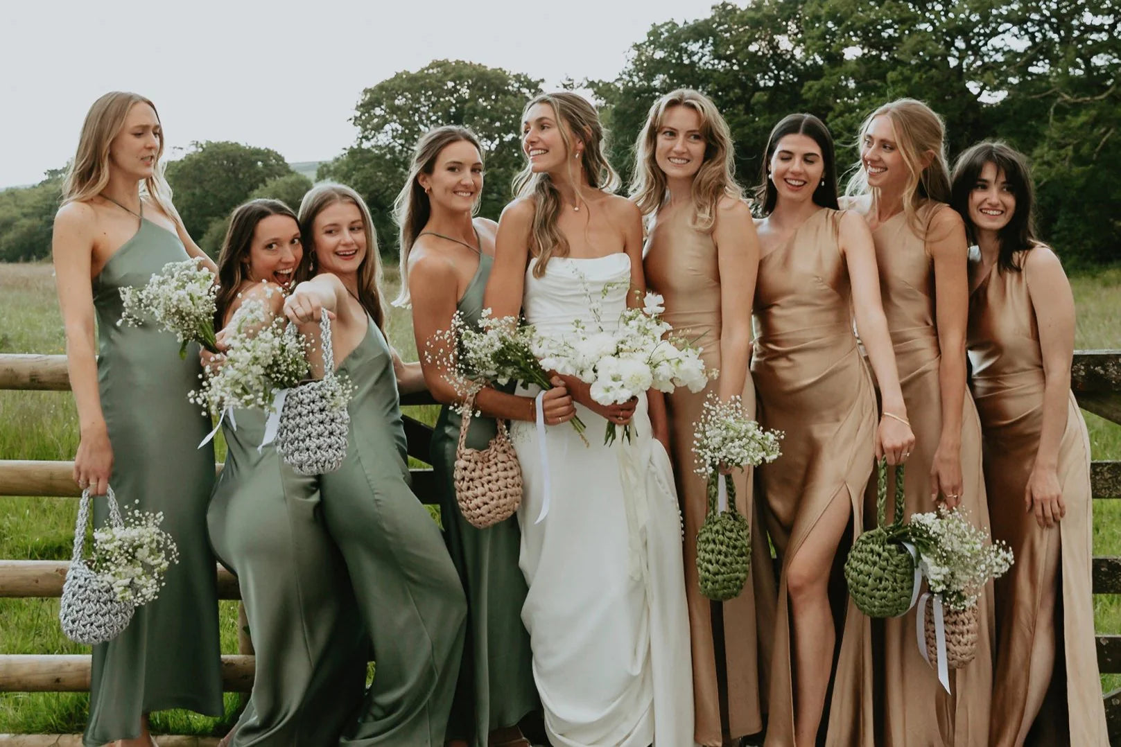 bride and bridesmaids wearing Hive handbag in champagne