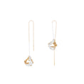 Load image into Gallery viewer, Gold and silver earrings on a white background
