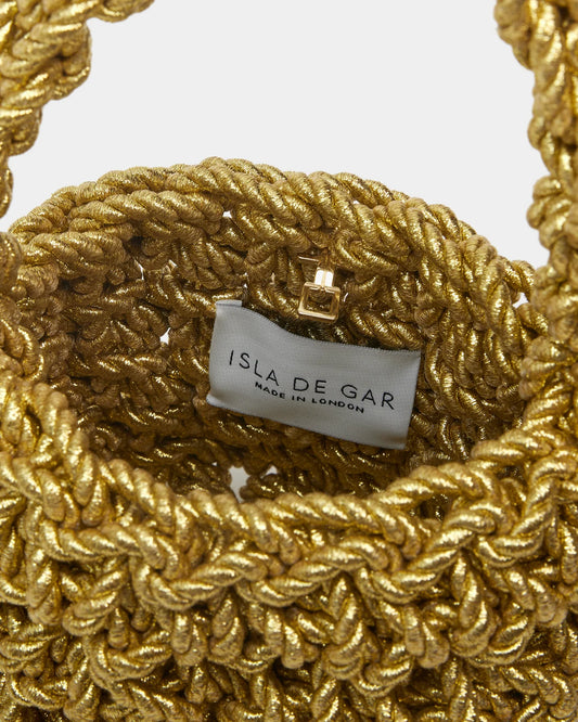 hive metallic handbag in gold