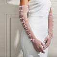 Load image into Gallery viewer, woman wearing Cornelia James blush bridal gloves
