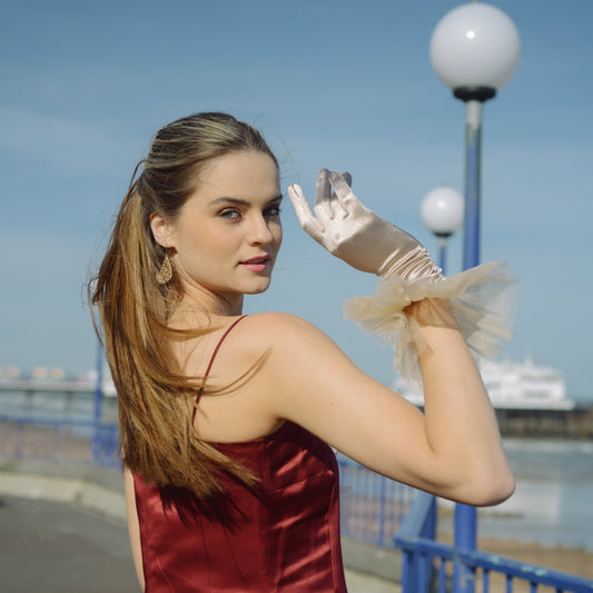 woman wearing Cornelia James bridal gloves