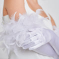 Load image into Gallery viewer, White gloves with feather details on a neutral background
