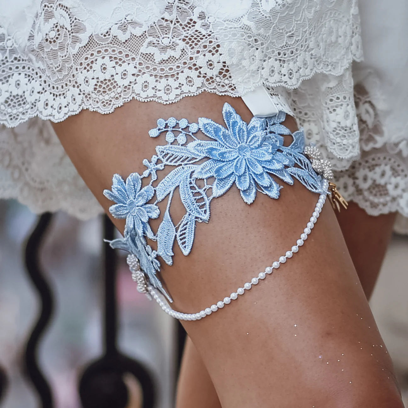 woman wearing hayze bridal blue senna garter