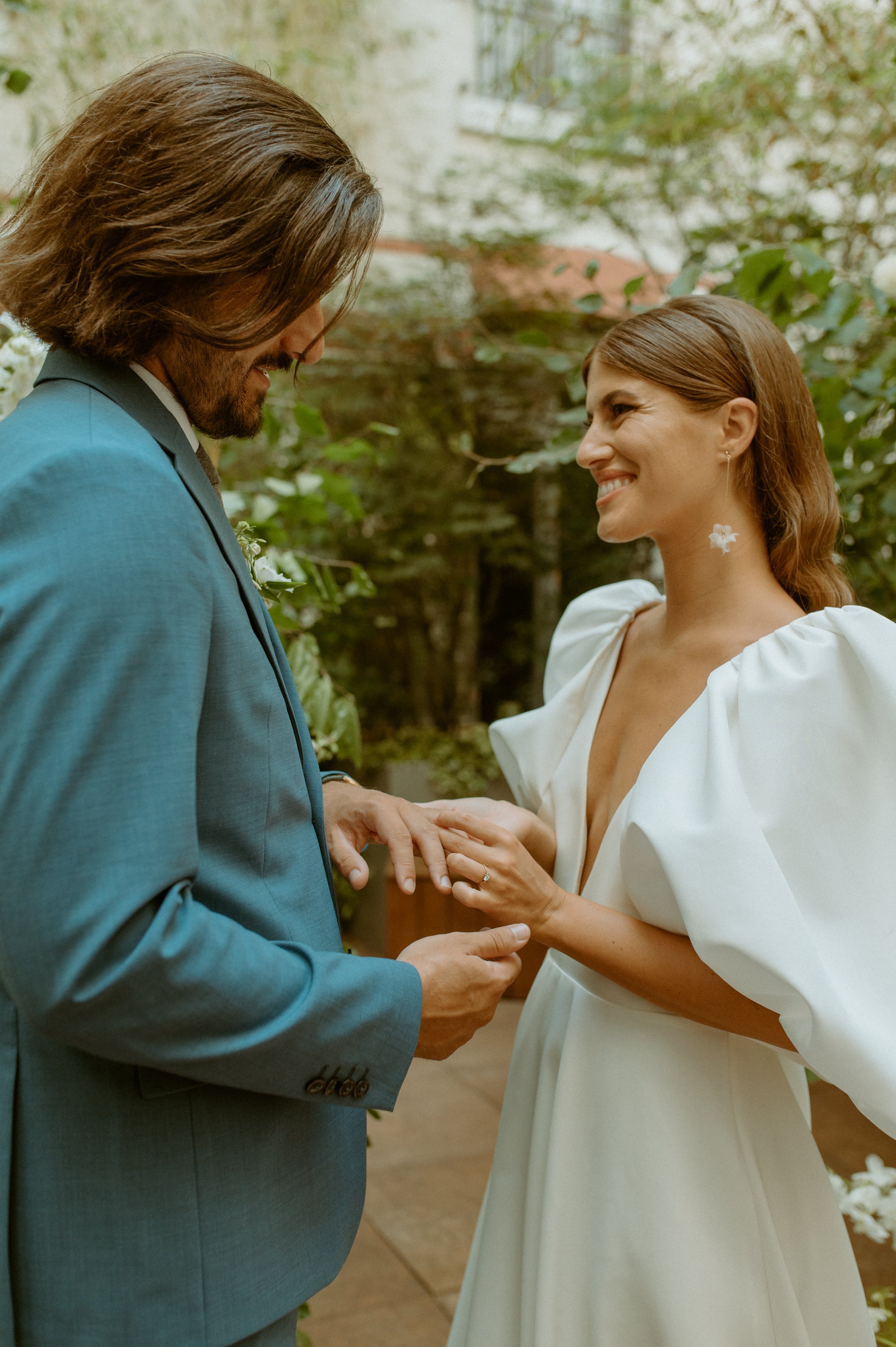 bride wearing Amarnam soling silk bridal earrings