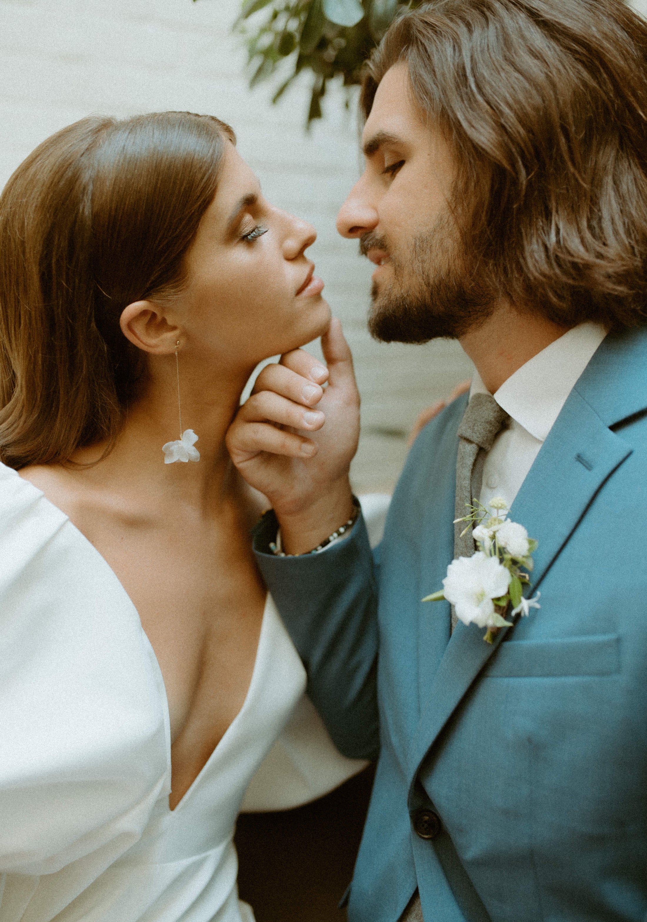 bride wearing Amarnam soling silk bridal earrings