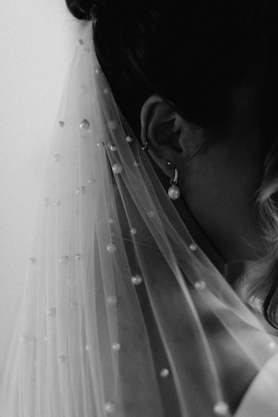 woman wearing hayze bridal veil