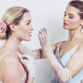 Load image into Gallery viewer, Two women wearing lace bridal gloves and formal dresses against a plain background
