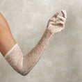 Load image into Gallery viewer, Lace bridal glove on a neutral background
