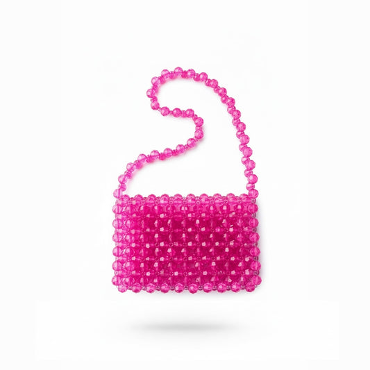 Pink beaded bridal handbag on a white background