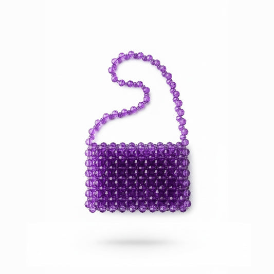 Purple beaded bridal handbag on a white background