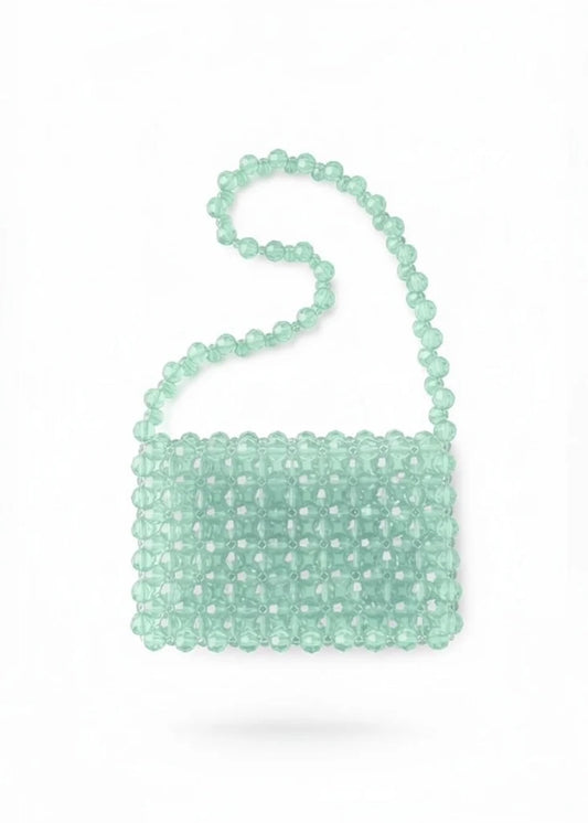 Mint green beaded bridal handbag on a white background