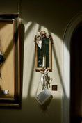Load image into Gallery viewer, Decorative shadow box with a candle on a wall with framed pictures with a bridal bag
