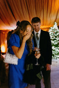 Load image into Gallery viewer, woman in a blue dress wearing a bridal bag
