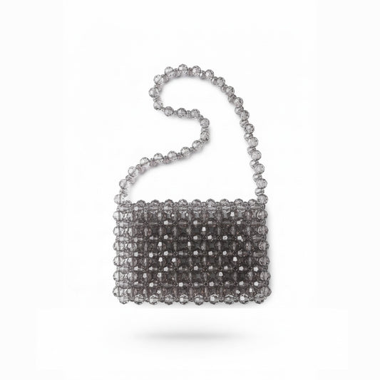 Silver beaded bridal handbag on a white background 