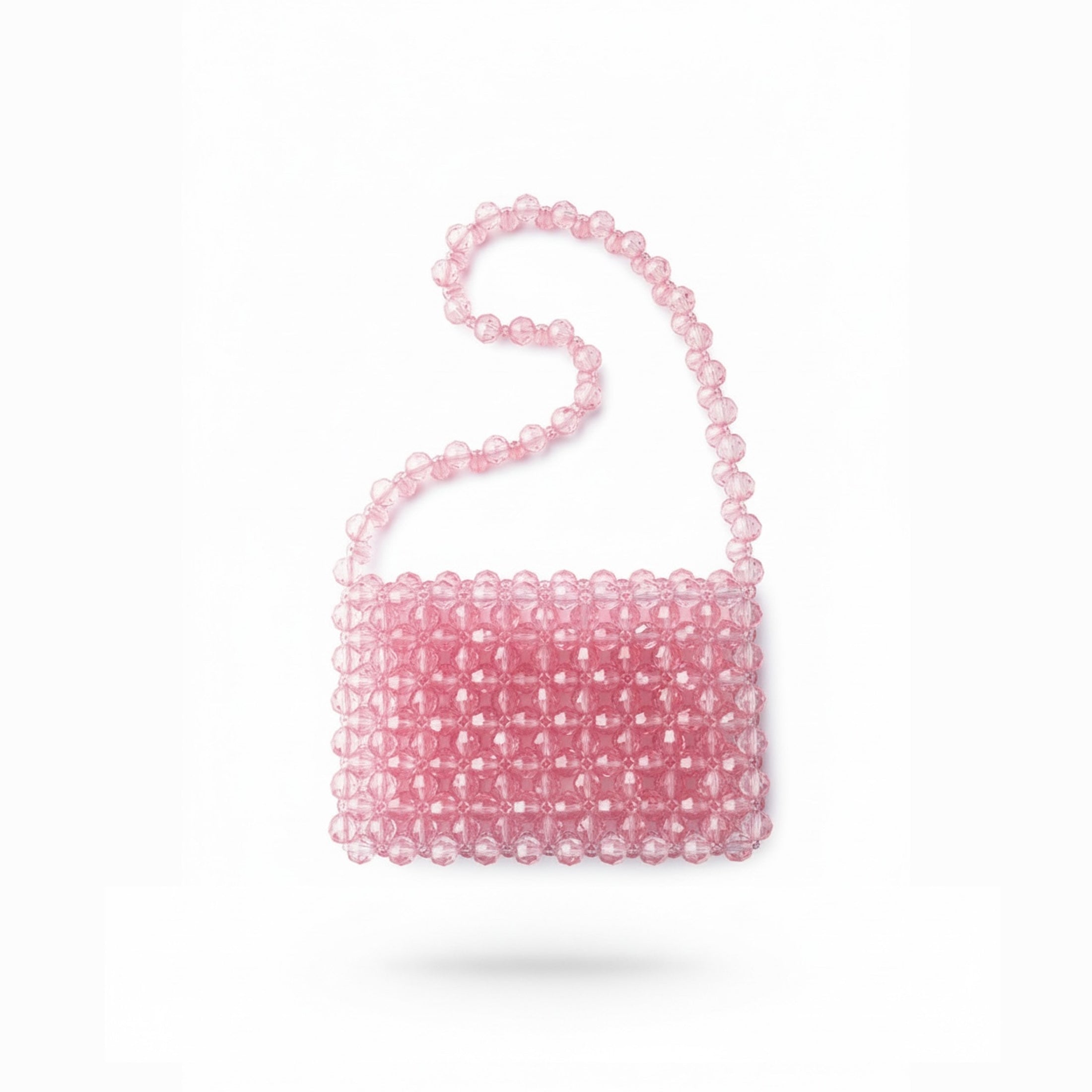 Pink beaded bridal bag on a white background