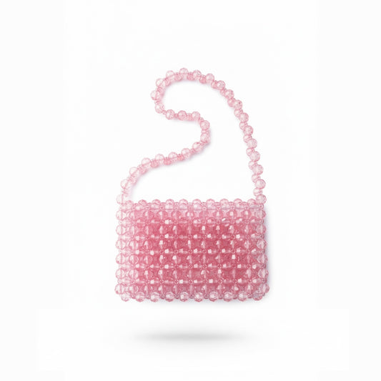 Pink beaded bridal bag on a white background