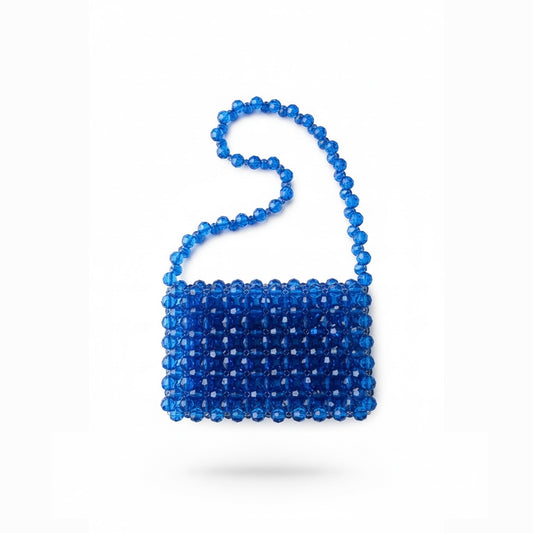 Blue beaded bridal bag on a white background