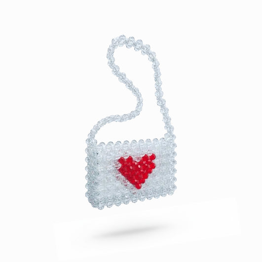 Bridal bag with a red heart design on a white background